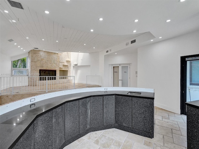 kitchen with french doors and lofted ceiling