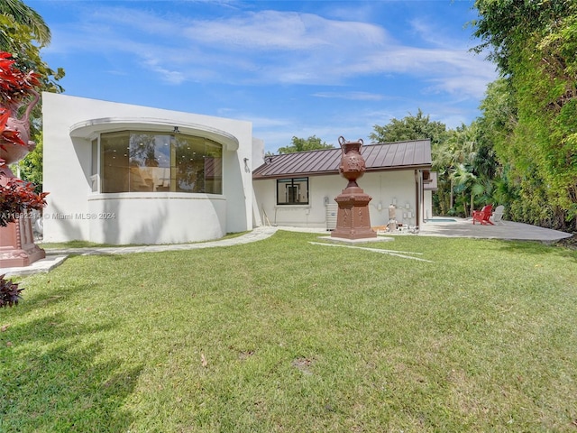 exterior space featuring a yard