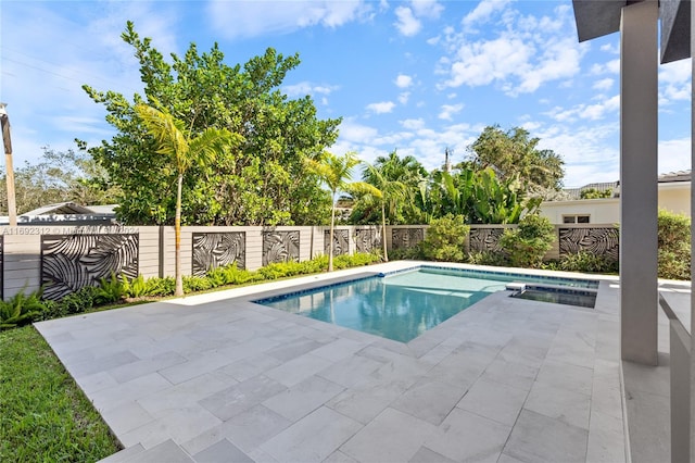 view of pool featuring a patio