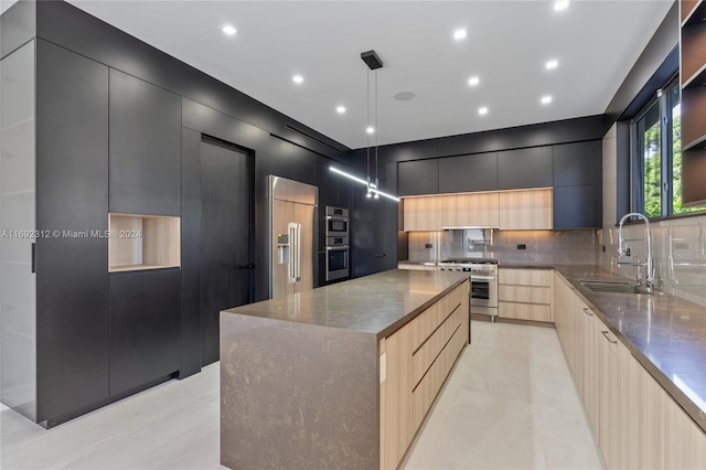 kitchen featuring pendant lighting, sink, decorative backsplash, a large island, and premium appliances