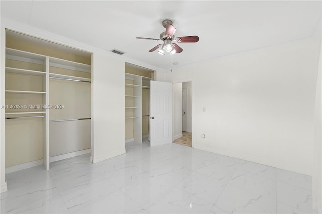 unfurnished bedroom with ceiling fan and ornamental molding