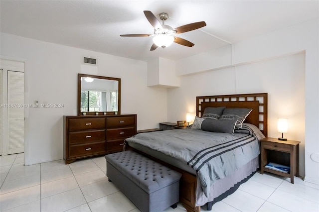 bedroom featuring ceiling fan and light tile patterned floors