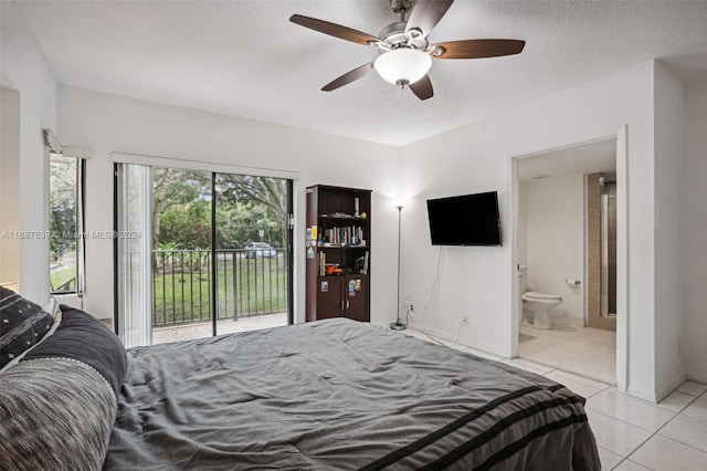 bedroom with light tile patterned flooring, ceiling fan, a textured ceiling, connected bathroom, and access to outside