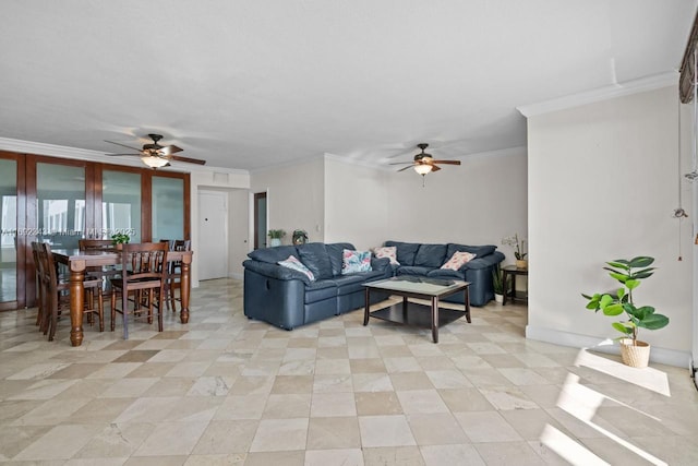 living room with crown molding and ceiling fan