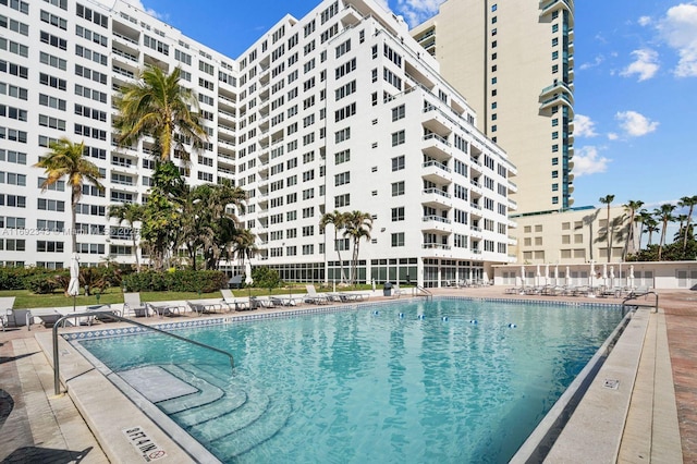 view of swimming pool featuring a patio