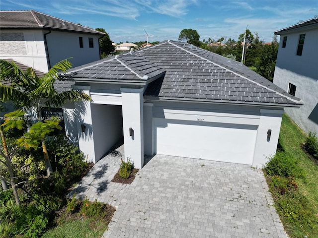 view of front of property featuring a garage