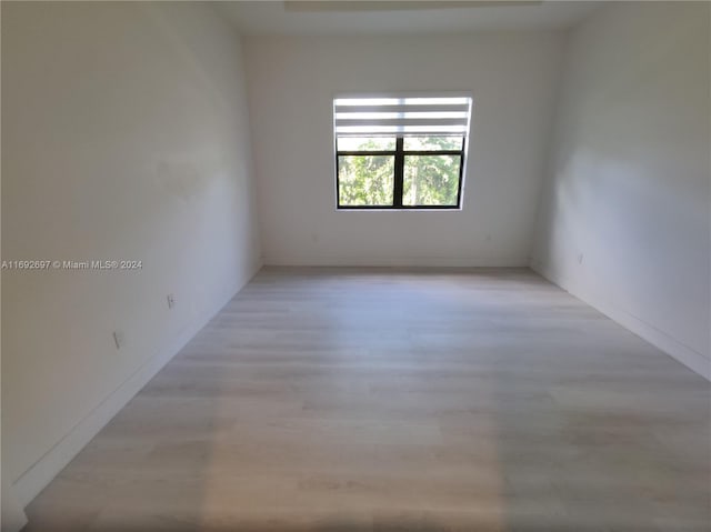 empty room with light wood-type flooring