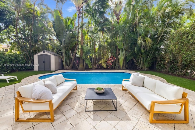 view of swimming pool with a storage unit, outdoor lounge area, and a patio