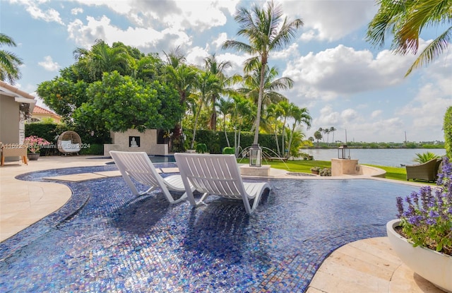 view of patio / terrace with a water view