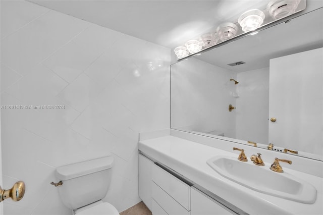 16570 NE 26th Ave Unit 2A, North Miami Beach, FL 33160 - bathroom with toilet and vanity