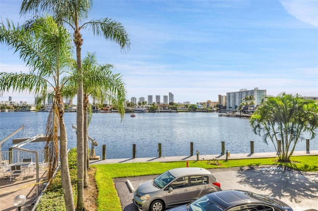 16570 NE 26th Ave Unit 2A, North Miami Beach, FL 33160 - water view featuring a dock and nearby urban area