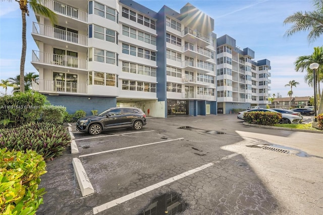 16570 NE 26th Ave Unit 2A, North Miami Beach, FL 33160 - view of apartment building / complex with uncovered parking
