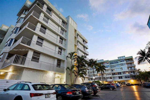 16570 NE 26th Ave Unit 2A, North Miami Beach, FL 33160 - view of apartment building / complex with uncovered parking