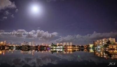 16570 NE 26th Ave Unit 2A, North Miami Beach, FL 33160 - water view featuring a view of city lights