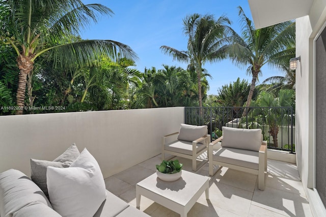 view of patio featuring a balcony