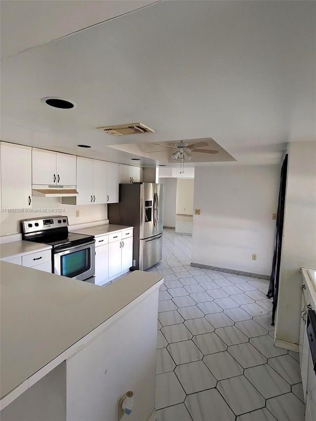 kitchen with white cabinets, ceiling fan, and appliances with stainless steel finishes