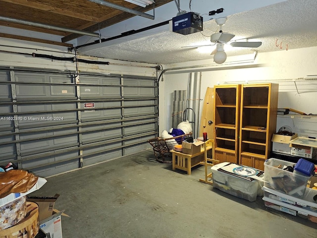 garage with a garage door opener and ceiling fan