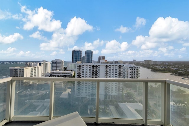 balcony featuring a water view