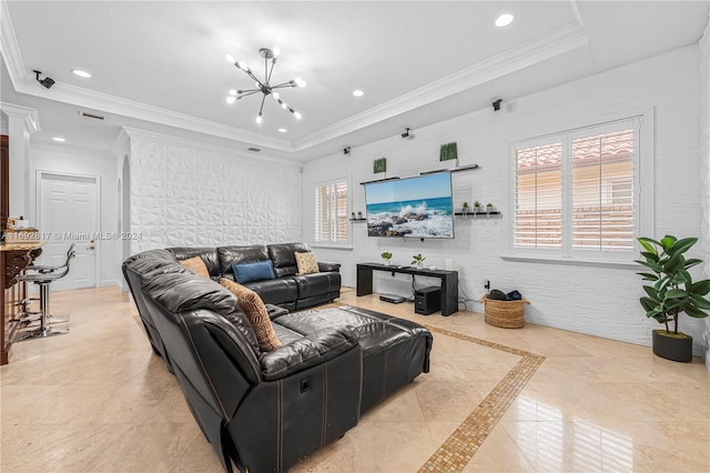 living room featuring a notable chandelier, a healthy amount of sunlight, and crown molding