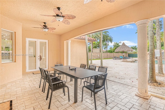 view of patio / terrace featuring ceiling fan