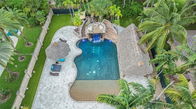 view of pool with pool water feature and a patio area