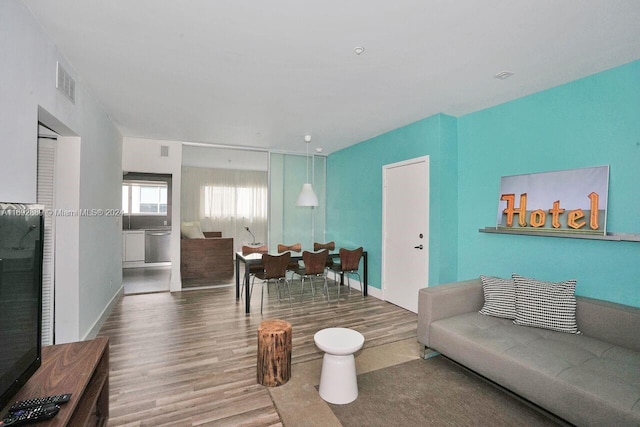 living room with hardwood / wood-style floors