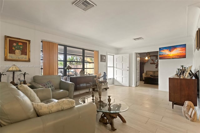 living room featuring ceiling fan