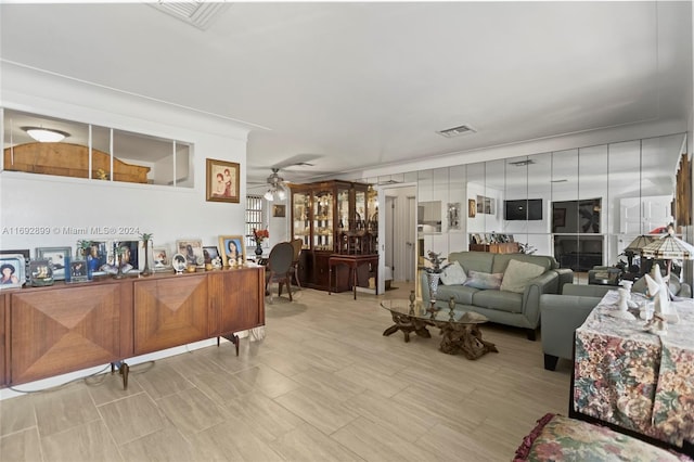 living room featuring ceiling fan