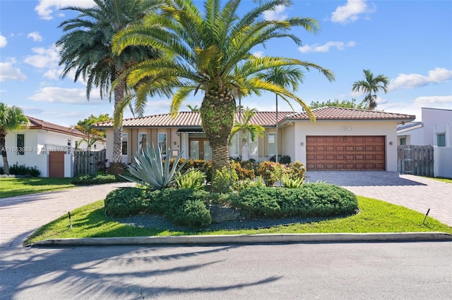 view of front of property featuring a garage