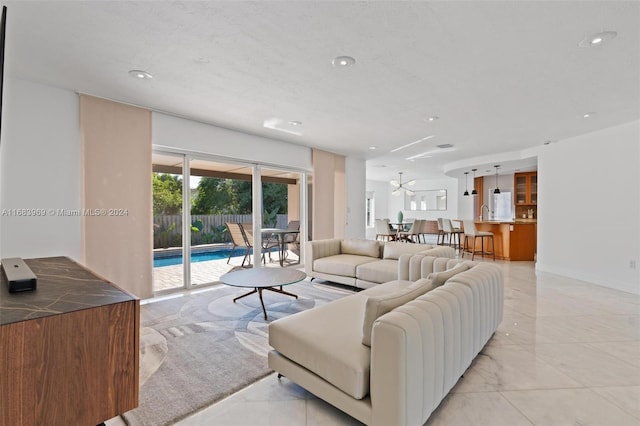 living room with a notable chandelier