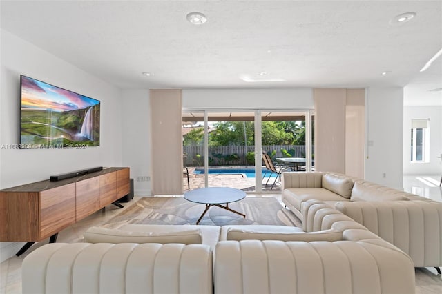 living room with light hardwood / wood-style floors