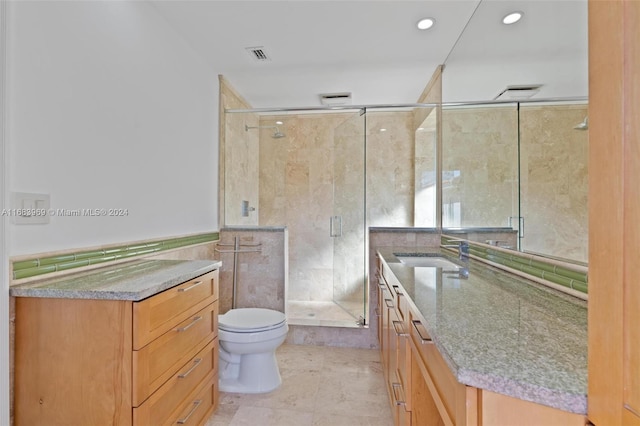 bathroom with tile walls, an enclosed shower, toilet, and tile patterned flooring