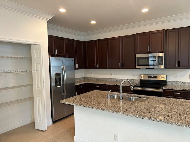 kitchen featuring crown molding, sink, light tile patterned floors, light stone countertops, and appliances with stainless steel finishes