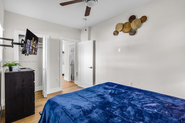 bedroom with hardwood / wood-style flooring and ceiling fan