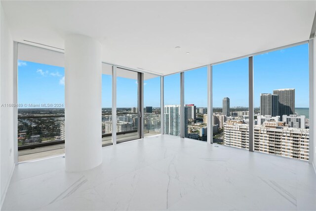 interior space with expansive windows and plenty of natural light