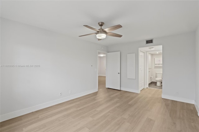 unfurnished bedroom featuring ceiling fan, light hardwood / wood-style floors, and ensuite bath