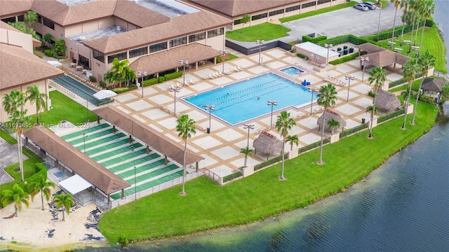 birds eye view of property featuring a water view