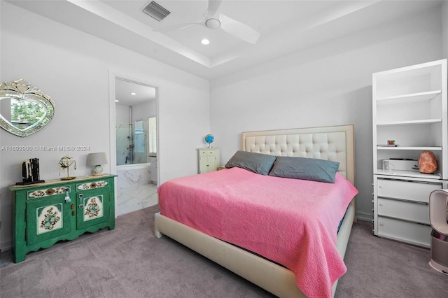 carpeted bedroom with ceiling fan and connected bathroom