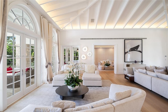 living room featuring wood-type flooring, vaulted ceiling with beams, wood ceiling, and french doors