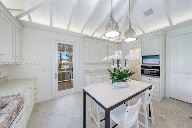 view of patio / terrace with exterior kitchen, a grill, and ceiling fan