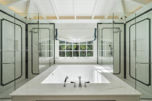 bathroom featuring beamed ceiling and plus walk in shower