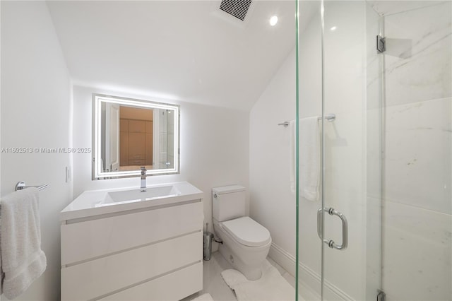 bathroom with a shower with door, vanity, lofted ceiling, and toilet