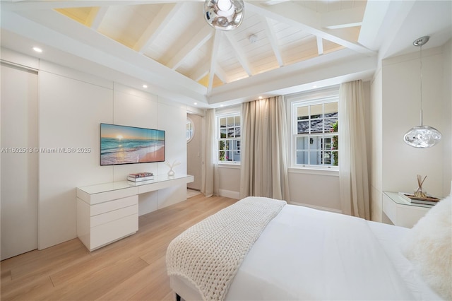 bedroom featuring wood ceiling, light hardwood / wood-style floors, and vaulted ceiling with beams