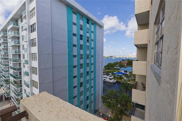 view of building exterior with a water view