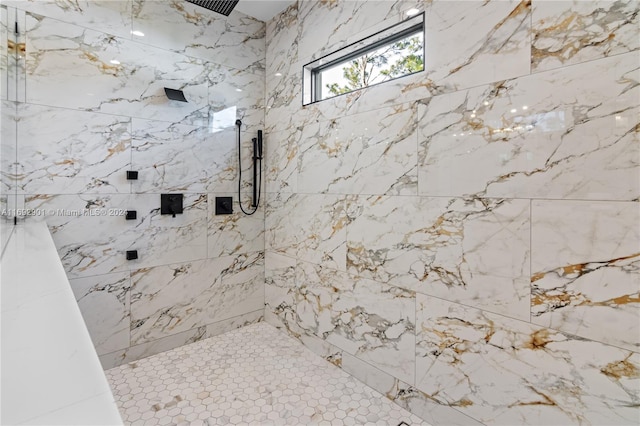 bathroom featuring a tile shower