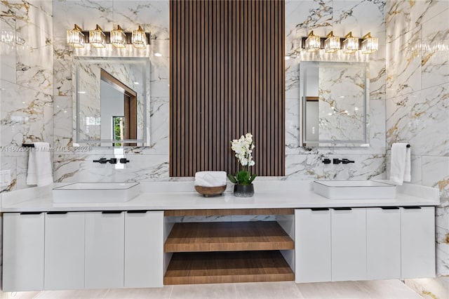 bathroom featuring tile walls and vanity