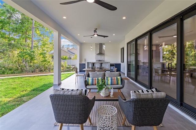 view of patio featuring ceiling fan and an outdoor hangout area