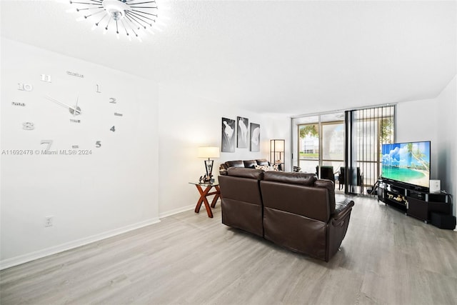 living room with light hardwood / wood-style flooring