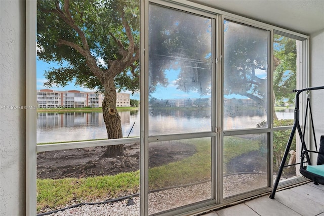 entryway featuring a water view