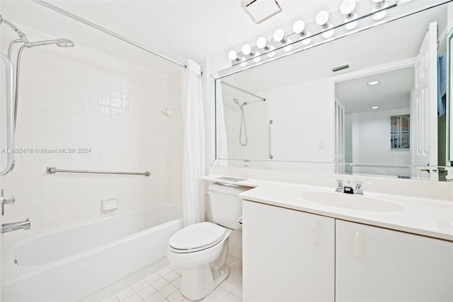 full bathroom featuring tile patterned floors, vanity, shower / tub combo, and toilet